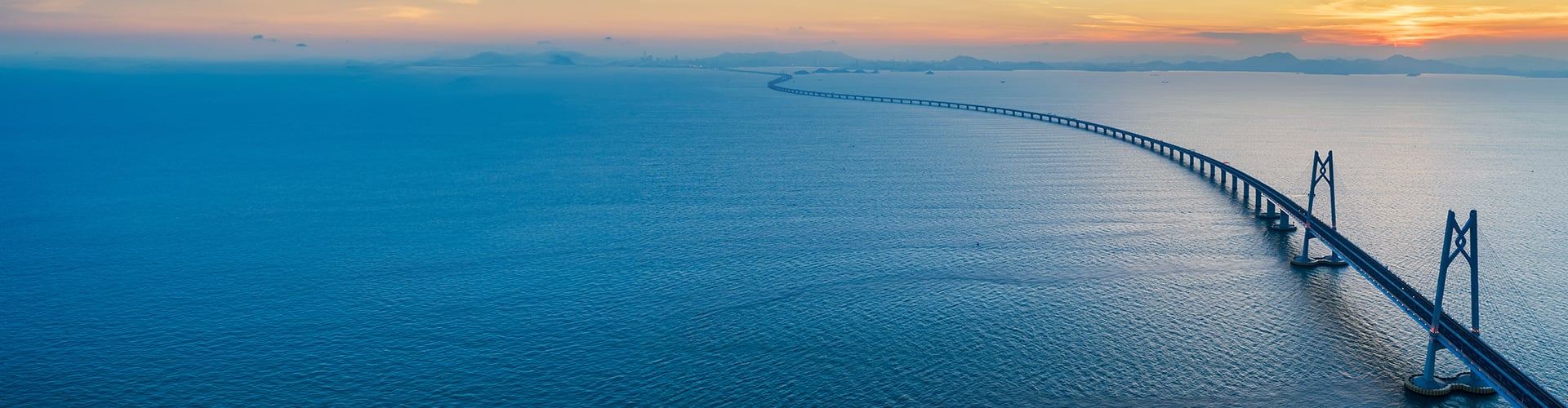 Global Outlooks 2024 Insights   Sea Crossing Bridge Above Blue Sea 